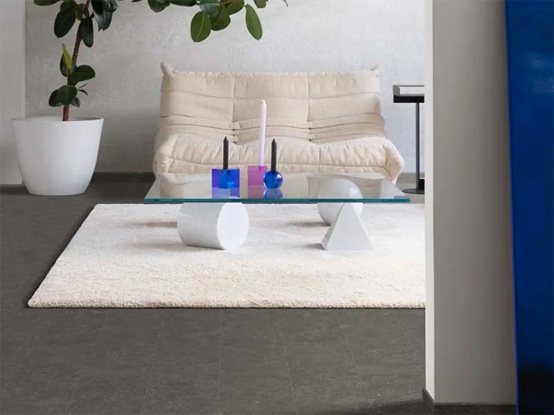 art deco woonkamer antraciet betonlook pvc vloer