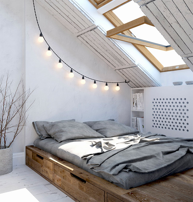 kleine slaapkamer zolder schuin dak bed opbergruimte